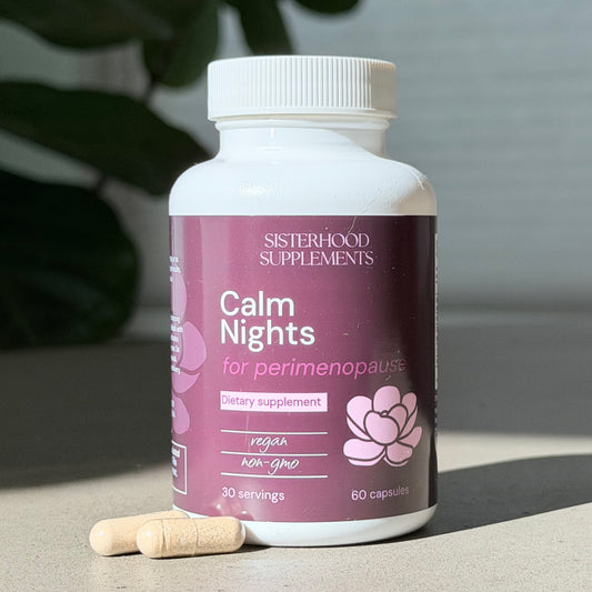 Supplement bottle labeled 'Calm Nights' for perimenopause by Sisterhood Supplements on a neutral background.